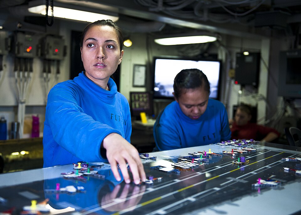 Los Angeles Moves — Flickr - Official U.S. Navy Imagery - Aviation Boatswain’s Mate (Handling) Airman Jaqueline Casanova moves aircraft across the Ouija board in flight deck control aboard USS John C. Stennis (CVN 74).